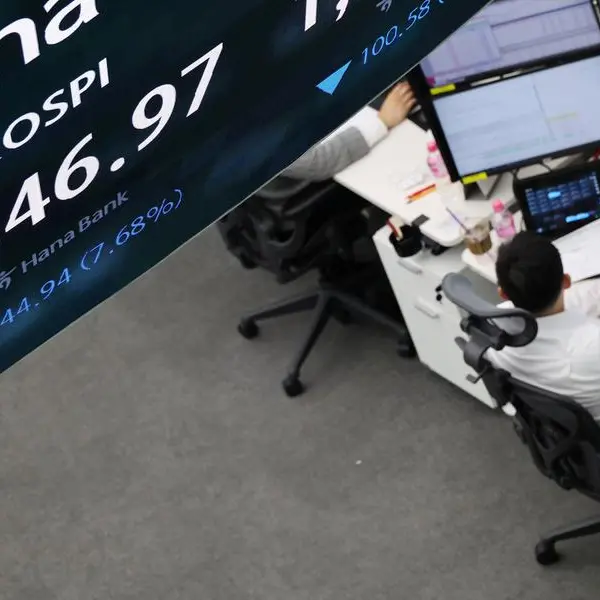 Asian stocks hit record high, dollar wobbles on peace deal hopes
