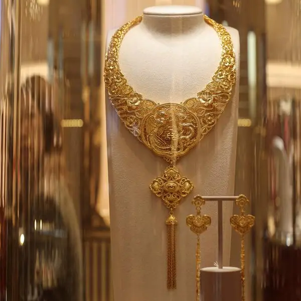 Gold, silver drop on firm dollar, broad market selloff