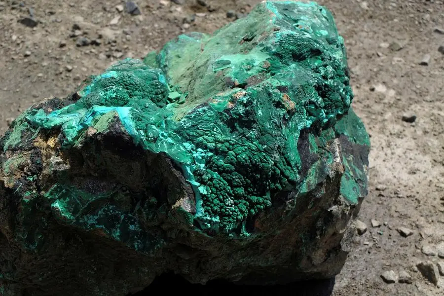 FILE PHOTO: A piece of malachite, a copper ore, is seen at the bottom of Congolese state mining company Gecamines\\' Kamfundwa open pit copper mine January 31, 2013. REUTERS/Jonny Hogg. , Reuters