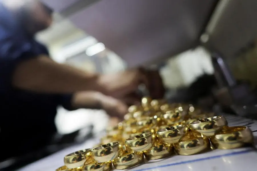 FILE PHOTO: An Egyptian employee checks gold rings at the workshop of \"GM Joneer Gold\" a gold jewellery manufacturer at \"El Sagha\" in Cairo, Egypt January 14, 2024. REUTERS/Amr Abdallah Dalsh. , Reuters/REUTERS
