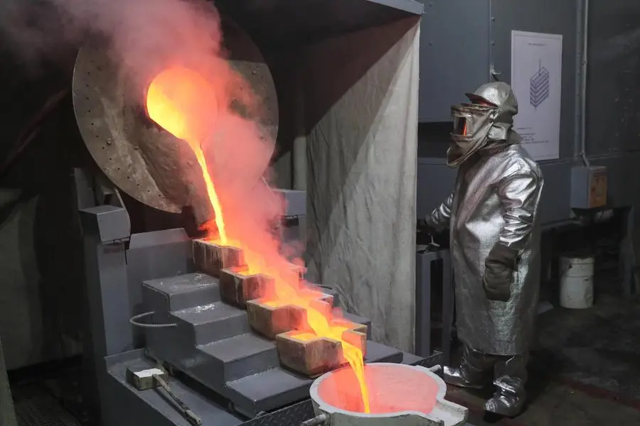 A smelter operates an induction furnace during the production of gold-bearing dore bars in a processing plant at Varvarinskoye gold deposit in the Kostanay region, Kazakhstan, April 16, 2025. REUTERS/Pavel Mikheyev. , Reuters