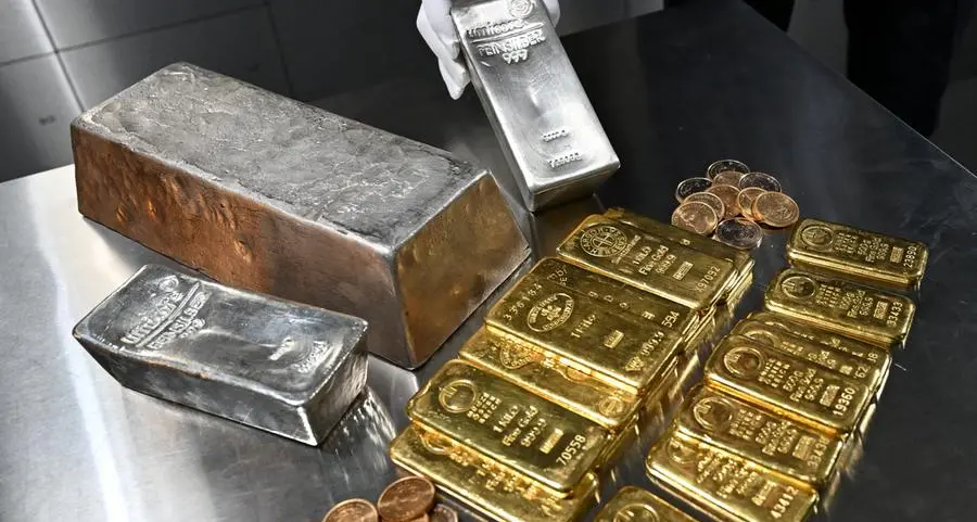 Gold, silver dip as dollar rises after strong US jobs data