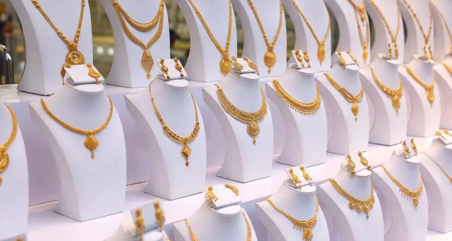 Gold holds steady as Fed rate cut bets offset dollar strength