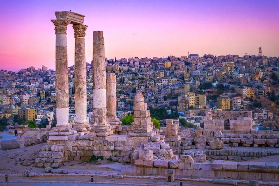 Amman, Jordan its Roman ruins in the middle of the ancient citadel park in the center of the city. Sunset on Skyline of Amman and old town of the city with nice view over historic capital of Jordan. Image used for illustrative purpose. Image courtesy: Getty Images/ Mbrand85