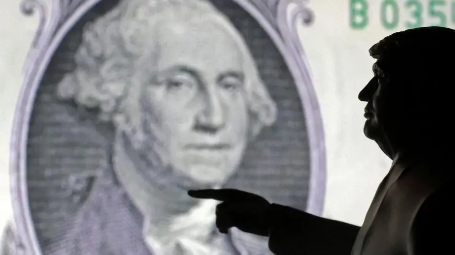 Dollar wobbles near multi-year lows as investors brace for Trump tariff deadline