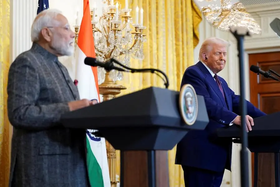 U.S. President Donald Trump grimaces while holding a joint press conference with Indian Prime Minister Narendra Modi at the White House in Washington, D.C., U.S., February 13, 2025. REUTERS/Nathan Howard. , Reuters