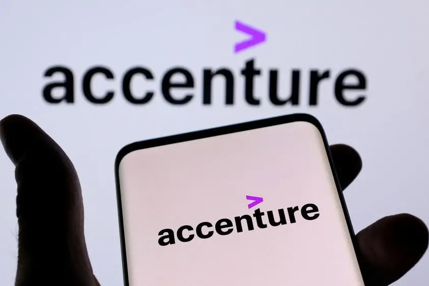 FILE PHOTO: Accenture PLC logo is seen on a smartphone in front of displayed same logo in this illustration taken, December 1, 2021. REUTERS/Dado Ruvic/Illustration/File Photo , Reuters/REUTERS