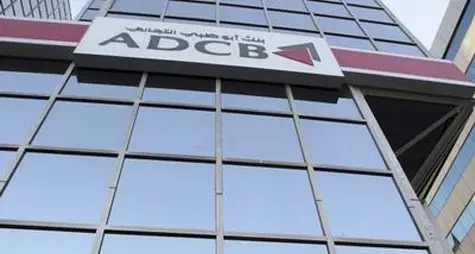 UPDATE 1-UAE bank ADCB beats estimates despite 12.3 pct Q2 net profit drop