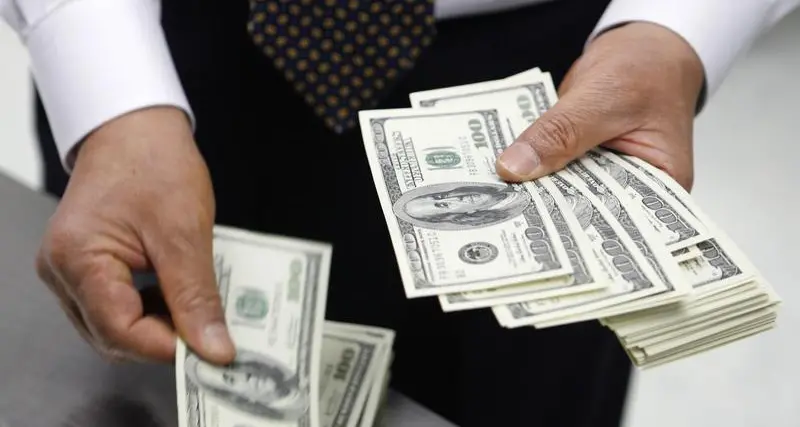 Dollar drops versus yen as Japanese officials signal possible intervention