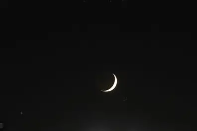 The crescent moon and planet Venus are seen in the sky over Amman\\r\\nImage used for illustrative purposes.  , Reuters Images/Muhammad Hamed