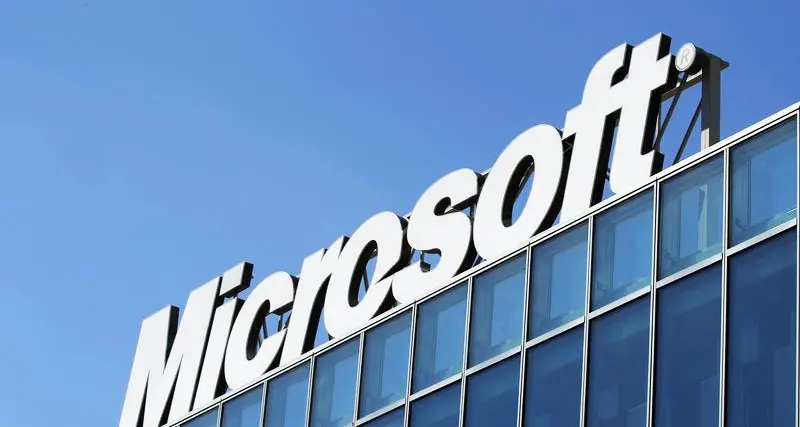UPDATE 3-Microsoft retreats in smartphone battle, 1,850 jobs to go
