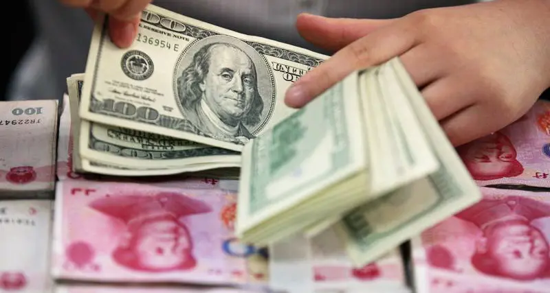 اليوان الصيني يهبط لأدنى مستوى في خمس سنوات ونصف أمام الدولار الامريكي