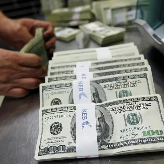 Dollar set to eke out weekly gain as traders weigh US rates, yen wobbles