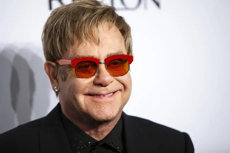 Musician Elton John formerly owned Watford FC and until 2008 served as the club\\'s honorary life president. Image from Reuters. , Reuters Images/Eduardo Munoz 