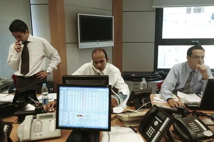 Image used for illustrative purpose Traders work at the Beltone Financial bank in Cairo October 13, 2008. , Reuters/Asmaa Waguih 