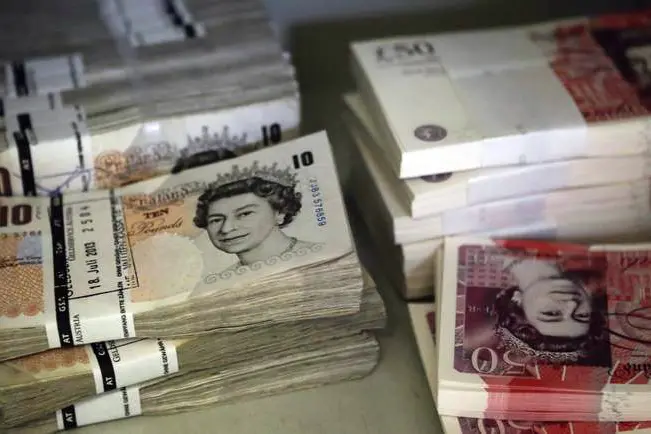London FX turnover slips from April record high; pound volumes rise
