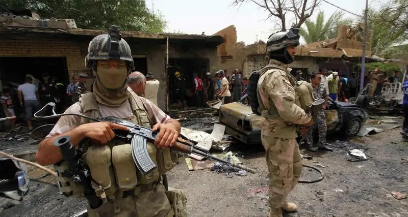 الشرطة: مقتل أكثر من 22 وإصابة 70 في تفجيرين ببغداد