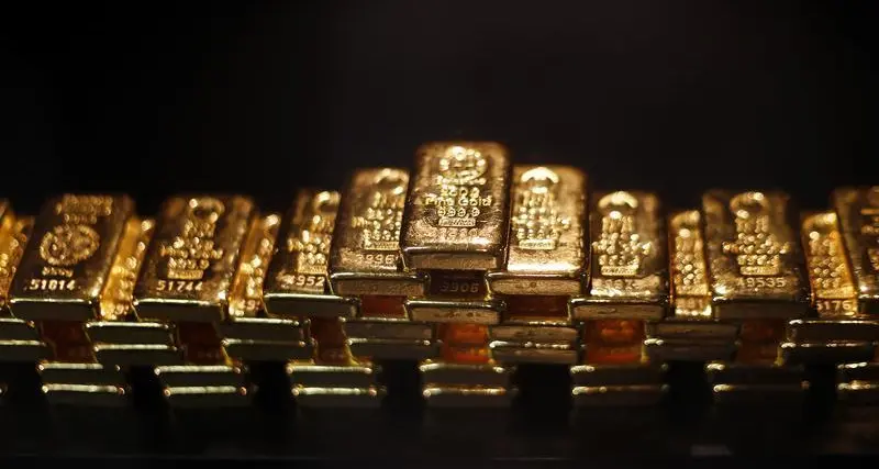 الذهب يتراجع إلى 1350 دولار للأوقية مع صعود الدولار والأسهم الأوروبية