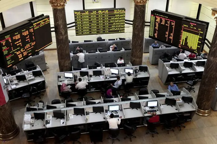 Traders work at the Egyptian stock exchange in Cairo July 4, 2013.Louafi Larbi