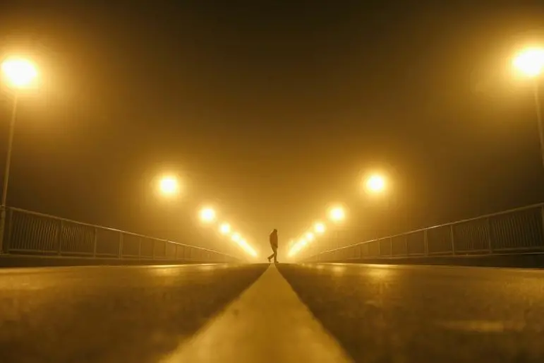 A man walks on the street during heavy smog in the central Bosnian town of Zenica, early November 19, 2014. REUTERS/Dado Ruvic  , Reuters Images/Dado Ruvic 