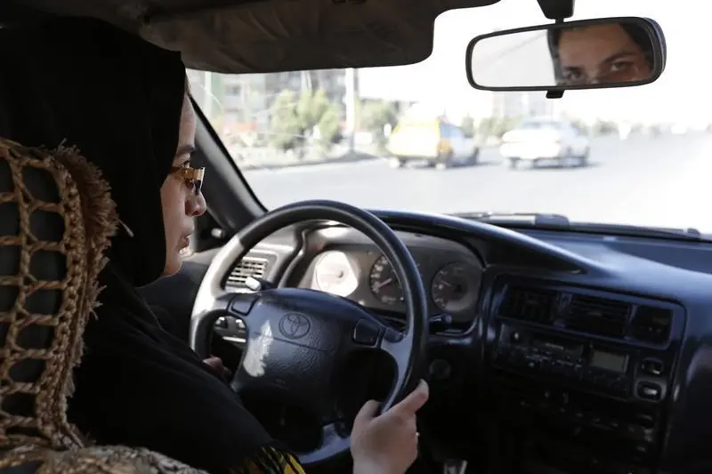 Tahmina drives during a practical driving lesson in Kabul September 4, 2014. Kabul is one of the world\\'s fastest growing cities and its streets are increasingly blocked by cars and buses. Image used for illustrative purpose , Reuters Images/Mohammad Ismail 
