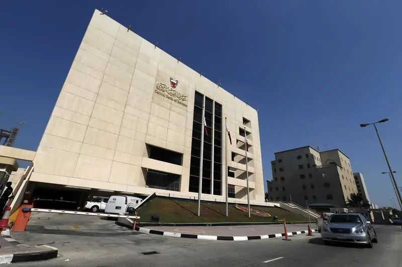 A car passes in front of the Central Bank of Bahrain in Manama, October 27, 2013. Hamad I Mohammed