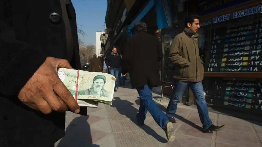 Iran's currency sinks to a new record low