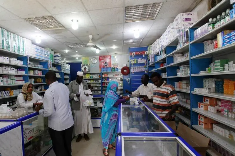 Customers buy medication at a pharmacy in Khartoum, January 24, 2012. Doing business has never been easy in Sudan, which suffers from a U.S. trade embargo, poverty, high inflation and the legacy of years of armed conflict. Even so the country, home to 32 million people and rich in oil, minerals such as gold and copper, and vast areas of farmland, has always attracted investors who do not mind taking some risks. But the investment climate has deteriorated further since South Sudan took away two-thirds of the country\\'s oil production when it seceded in July.  Picture taken January 24, 2012. To match feature SUDAN-INVESTMENT   REUTERS/ Mohamed Nureldin Abdallah  , Reuters Images/ Mohamed Nureldin Abdallah 