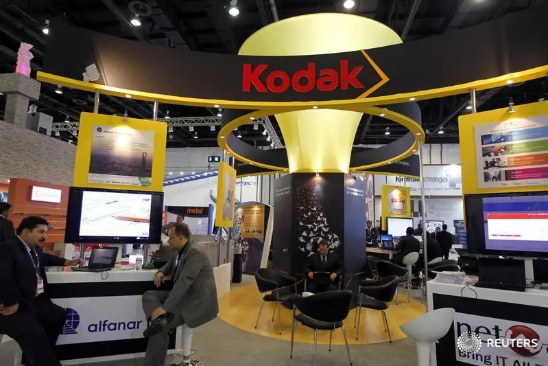 Exhibitors sit at the Kodak stand during the Gulf Information and Technology Exhibition (GITEX) at the Dubai World Trade Centre in Dubai October 14, 2012. REUTERS/Jumana ElHeloueh \\r\\nImage used for illustrative purposes.  , Reuters Images/Jumana ElHeloueh 