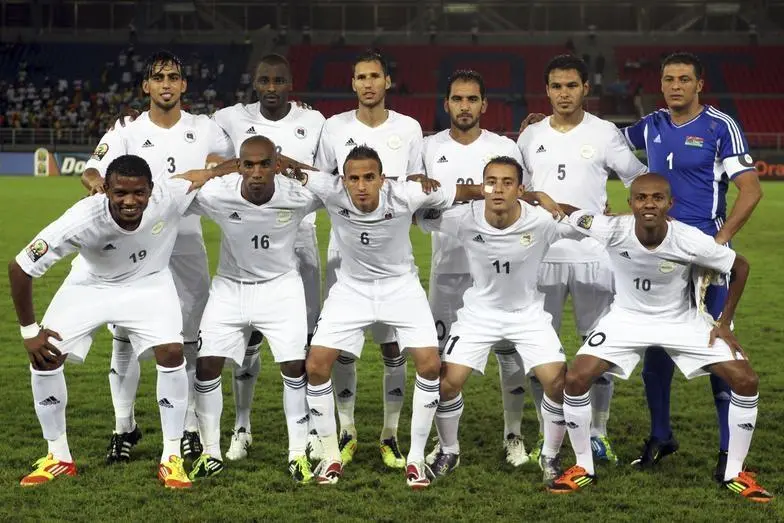 Libya\\'s players pose for a photograph before their African Cup of Nations Group A soccer match against Senegal at Estadio de Bata \"Bata Stadium\", in Bata January 29, 2012. REUTERS/Amr Abdallah Dalsh   , Reuters Images/Amr Abdallah Dalsh  