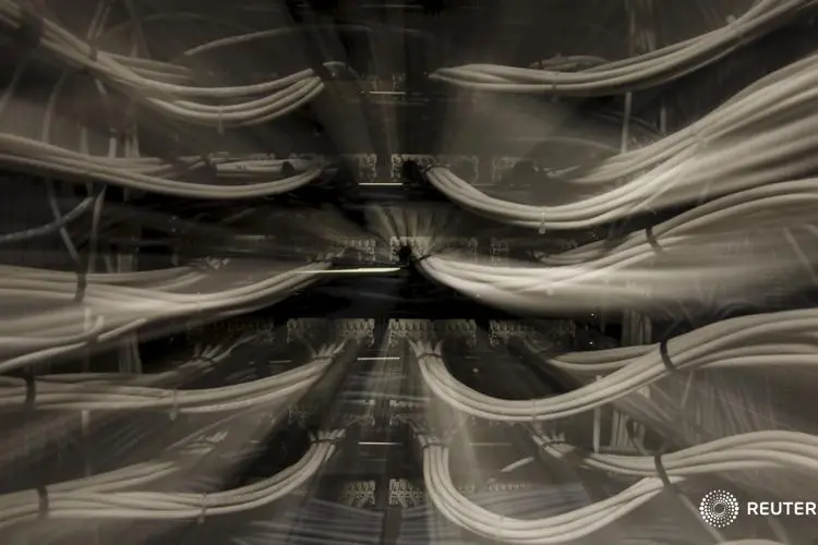 LAN cables are seen inside a data centre in Madrid, Spain, April 27, 2015. To match story TELEFONICA-SPAIN/PRICES   REUTERS/Sergio Perez - RTX1ARD8 , Reuters Images/Sergio Perez - RTX1ARD8