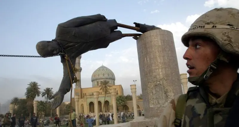 عراقي حطم تمثال صدام يطالب بمحاكمة بلير