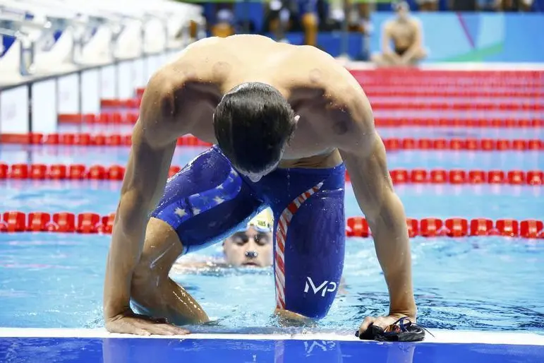 2016 Rio Olympics - Swimming - Final - Men\\'s 200m Individual Medley Final - Olympic Aquatics Stadium - Rio de Janeiro, Brazil - 11/08/2016. Michael Phelps (USA) of USA reacts after winning. REUTERS/David Gray  , Reuters Images/ David Gray