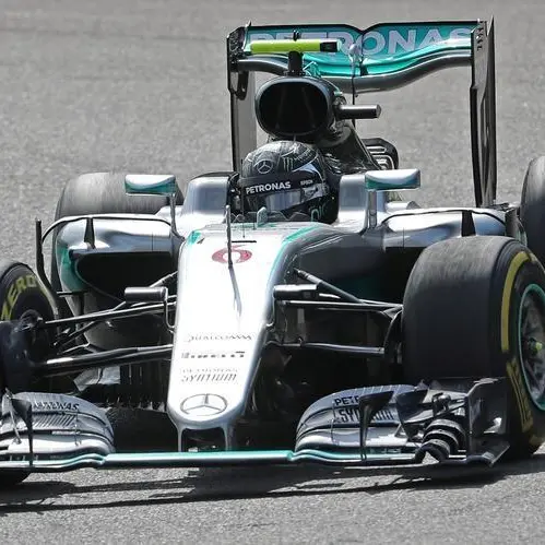 Motor racing-Rosberg eases to Belgian GP win, Hamilton third