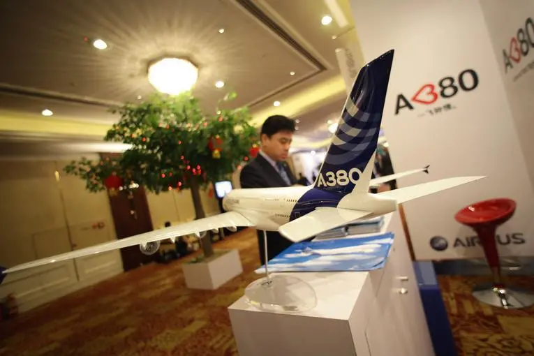 A delegate gets information from an Airbus booth during the 68th International Air Transport Association (IATA) annual general meeting in Beijing June 11, 2012.REUTERS/Jason Lee  , Reuters Images/Jason Lee 
