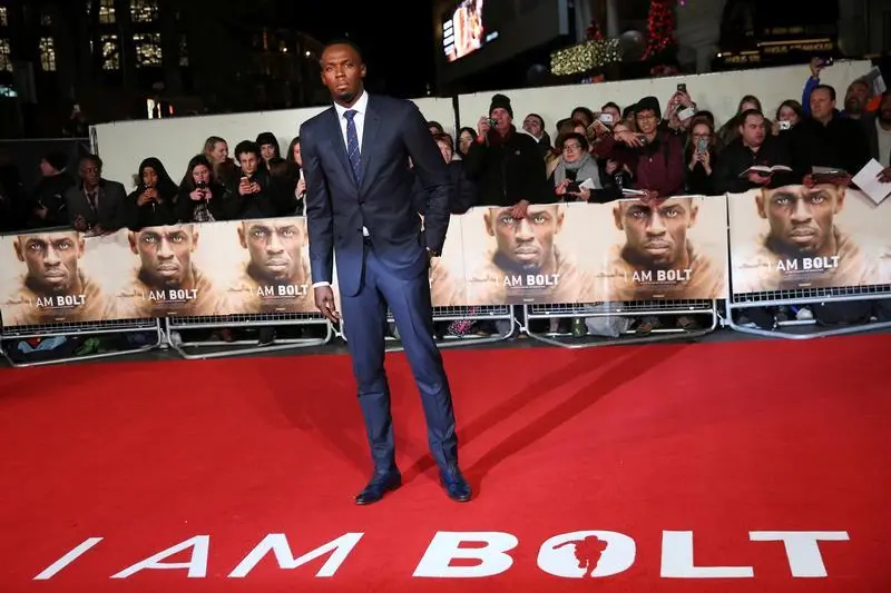 Athlete Usain Bolt (C) poses for photographers at the world premiere of the film \"I am Bolt\" in London, Britain November 28, 2016. REUTERS/Neil Hall  , Reuters Images/Neil Hall 