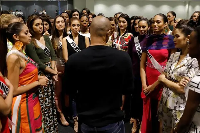 Miss Universe candidates listen to a briefing from an instructor during a rehearsal for the upcoming beauty pageant on January 30 in Manila, Philippines January 24, 2017.  REUTERS/Erik De Castro , Reuters Images/Erik De Castro