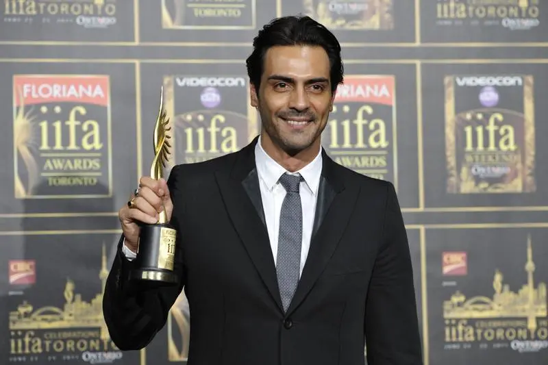 Image used for illustrative purpose.\\r\\nBollywood actor Arjun Rampal poses with his award for best supporting male for his role in \"Rajneeti\" during the International Indian Film Academy (IIFA) Awards in Toronto on June 25, 2011.   , Reuters Images/Mike Cassese 