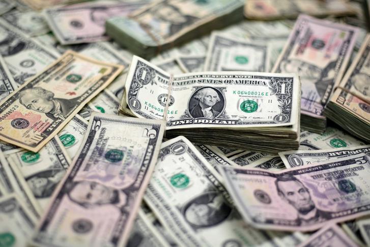 Dollar in tight range as traders eye Middle East, US data
