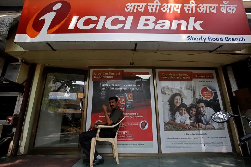 A security guard sits outside an ICICI bank branch in Mumbai, India, April 4, 2018.  , Reuters Images/Francis Mascarenhas 
