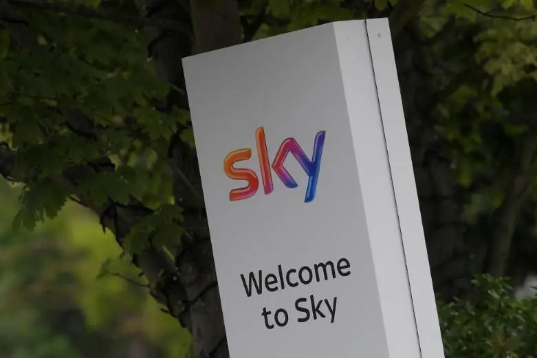 The Sky logo is seen on outside of an entrance to offices and studios in west London, Britain June 29, 2017.  , Reuters Images/Toby Melville