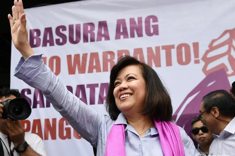 Ousted Philippine Supreme Court Justice Maria Lourdes Sereno waves to supporters at a rally outside the Supreme Court building on Taft Avenue, metro Manila, Philippines May 11, 2018.    , Reuters Images/Dondi Tawatao 