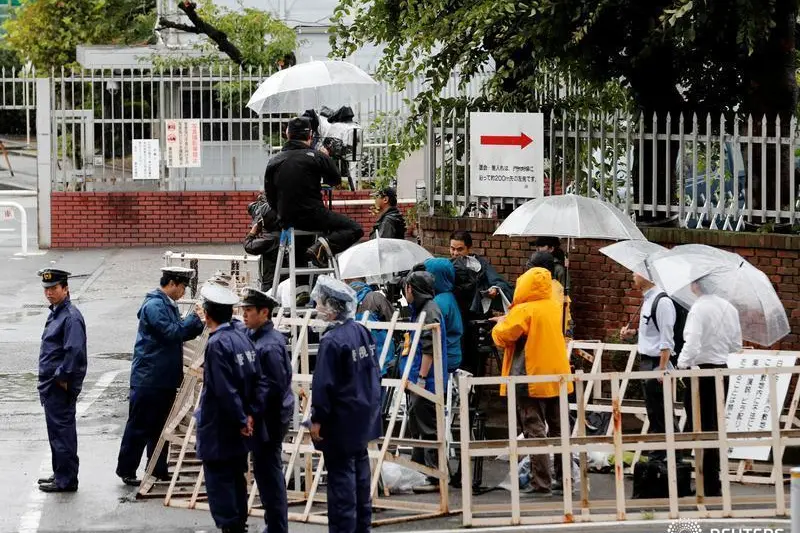 Journalists and policemen stand in front of Tokyo Detention Center where former leader of Aum, the Japanese doomsday cult, Chizuo Matsumoto, who went by the name Shoko Asahara, was executed,  in Tokyo, Japan July 6, 2018.  , Reuters Images/Kim Kyung-Hoon