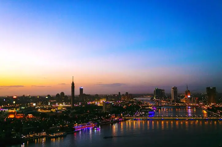 Image used for illustrative purpose. Illuminated City At Night Photo Taken In Egypt, Cairo Fadi Mckean / EyeEm Getty Images/EyeEm