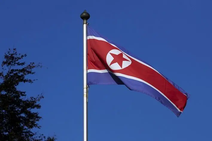 A North Korean flag flies on a mast at the Permanent Mission of North Korea in Geneva October 2, 2014. , Reuters Images/Denis Balibouse
