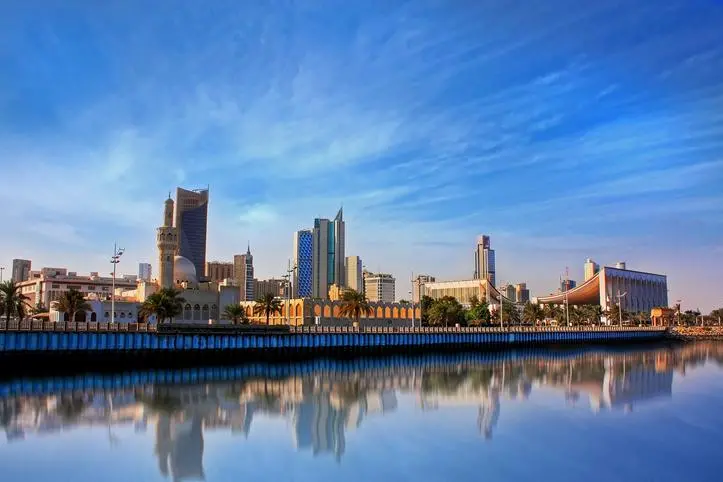 Parliament building and reflection of buildings, Kuwait City , Getty Images