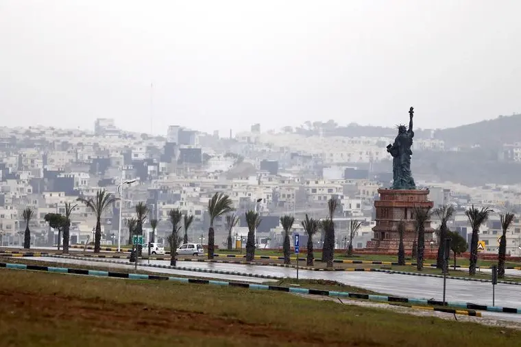 Image used for illustrative purpose.\\r\\nA replica of the Statue of Liberty stands on a hill overlooking the construction of new homes in Bahria Town on the outskirts of Islamabad, Pakistan March 16, 2016.  , Reuters Images/Caren Firouz 