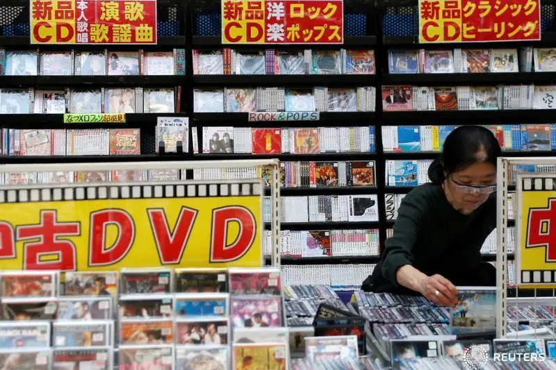 Music CDs and movie DVDs are displayed at an open-air shop in Tokyo, Japan, April 3, 2018.    , Reuters Images/Issei Kato 