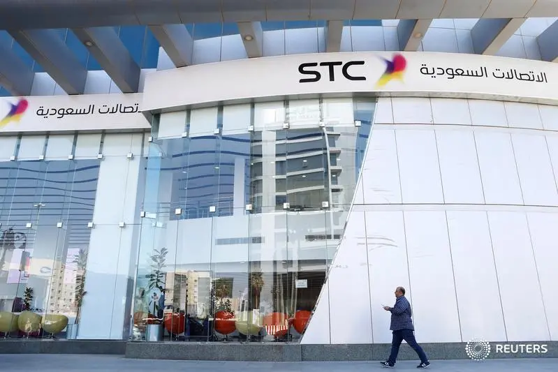 A man passes the Saudi Telecom STC office in Riyadh, Saudi Arabia February 6, 2018. Image used for illustrative purpose. Faisal Al Nasser