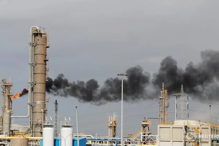 Image used for illustrative purpose. Flames shoot out of a chimney at Alexandria National Refining and Petrochemicals Company (ANRPC) along a highway of Alexandria, Egypt March 5, 2019.Amr Abdallah Dalsh. , Reuters